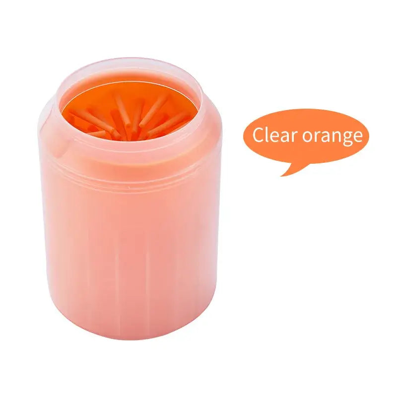 Pet paw wash cup in clear orange color, designed for easy cleaning of pets' paws after walks.