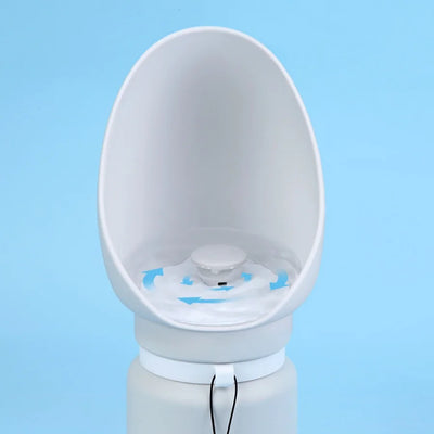 Portable dog water bottle with collapsible cup, perfect for outdoor adventures and hydration.