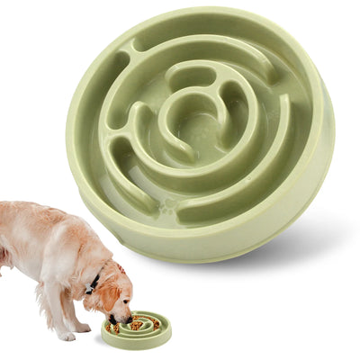 French Bulldog using a colorful slow food bowl designed to promote healthy eating habits and prevent indigestion.