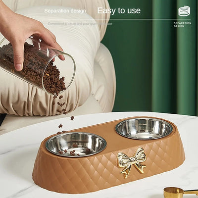 Light luxury pet double bowl in brown, green, and white, featuring a bow design for food and water.