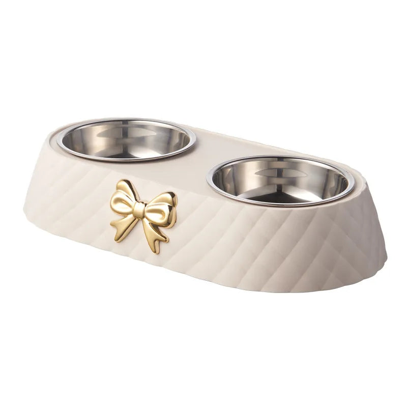 Light luxury pet double bowl in brown, green, and white, featuring a bow design for food and water.