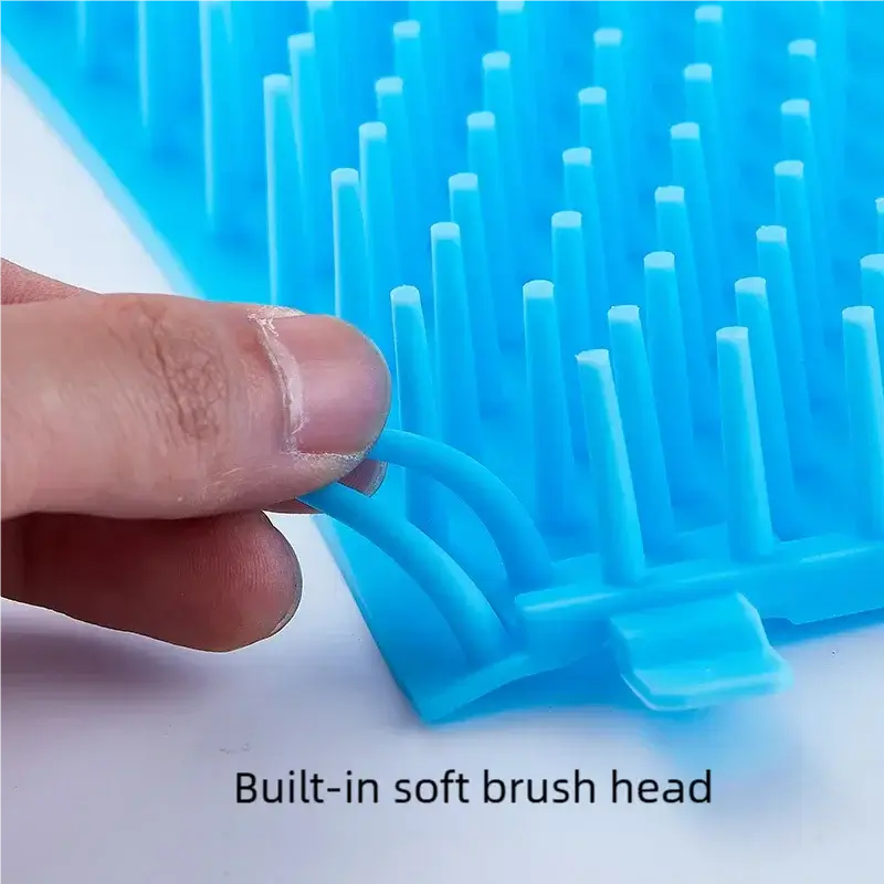 Close-up of the pet paw wash cup showing the built-in soft brush head for gentle cleaning of dogs and cats.