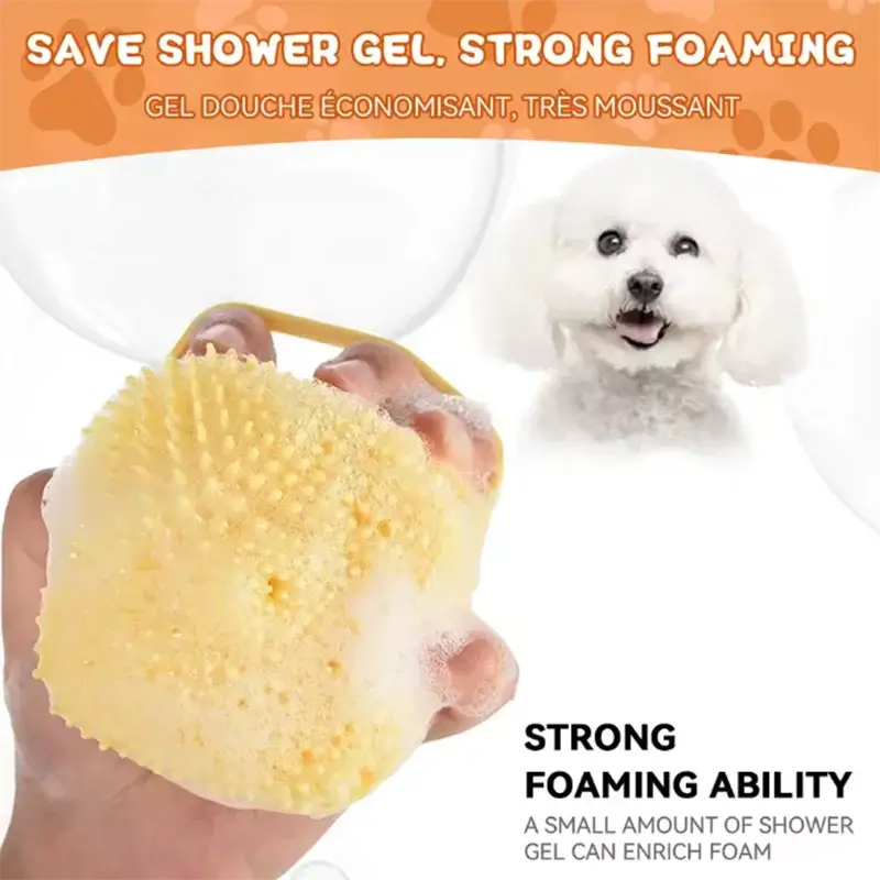 Pet bath brush silicone in hand, demonstrating strong foaming ability for efficient dog and cat grooming.