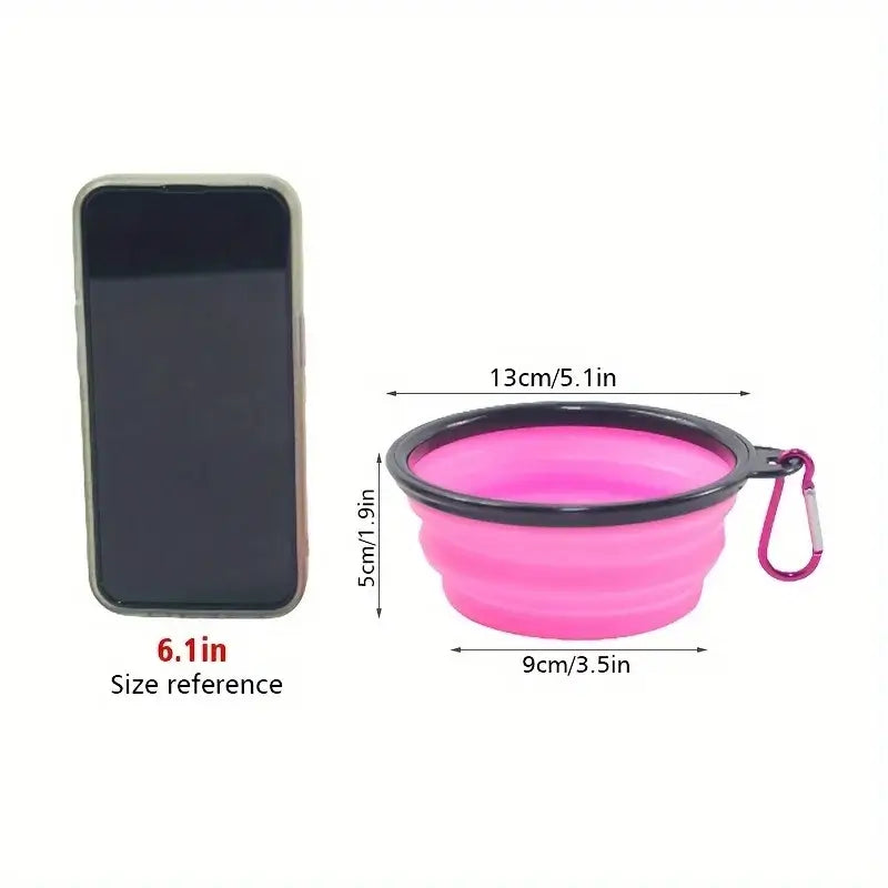 Folding dog bowl for camping next to a smartphone for size reference, showcasing its portable and lightweight design.